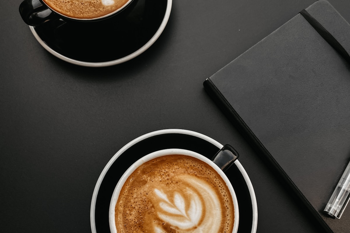 Two cappuccinos served at an Italian-style café